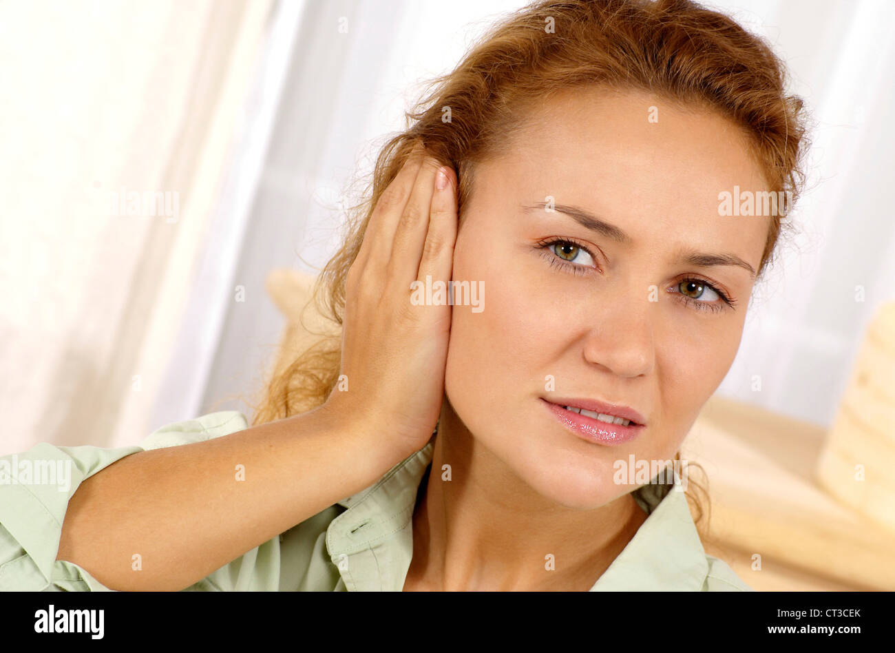 EAR PAIN IN A WOMAN Stock Photo Alamy