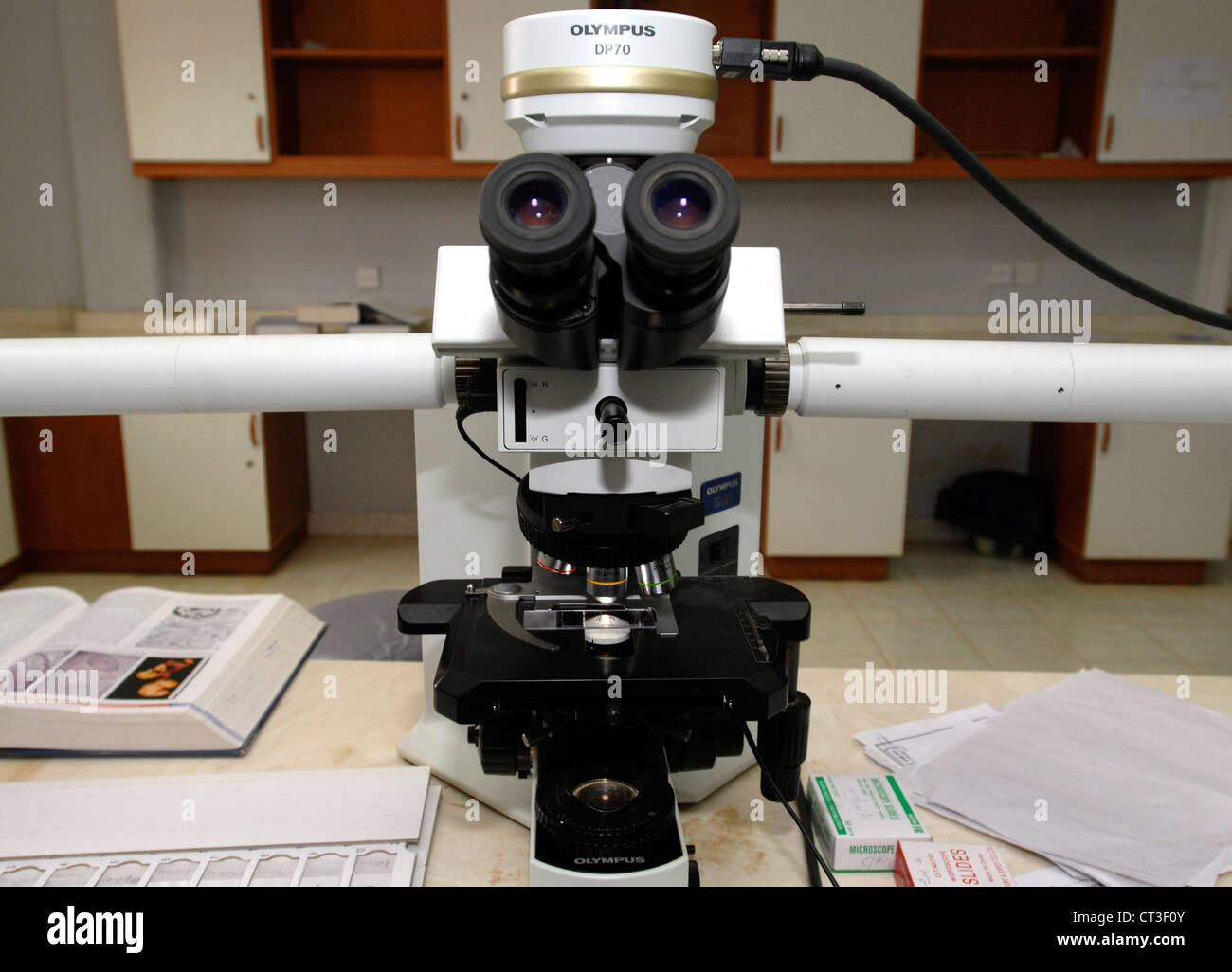 A microscope set on x100 magnification. Stock Photo