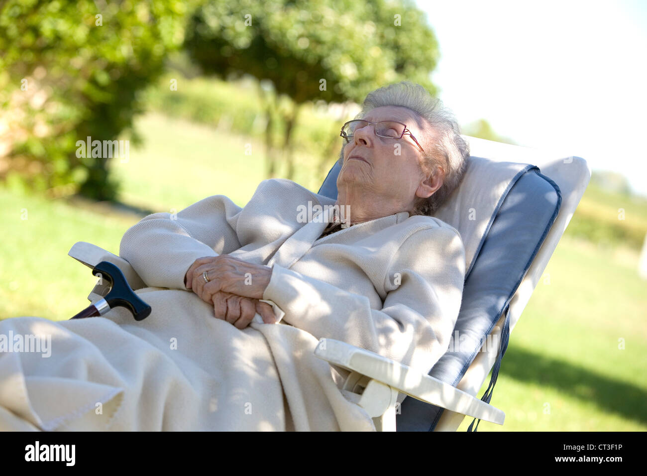 ELDERLY PERSON RESTING Stock Photo