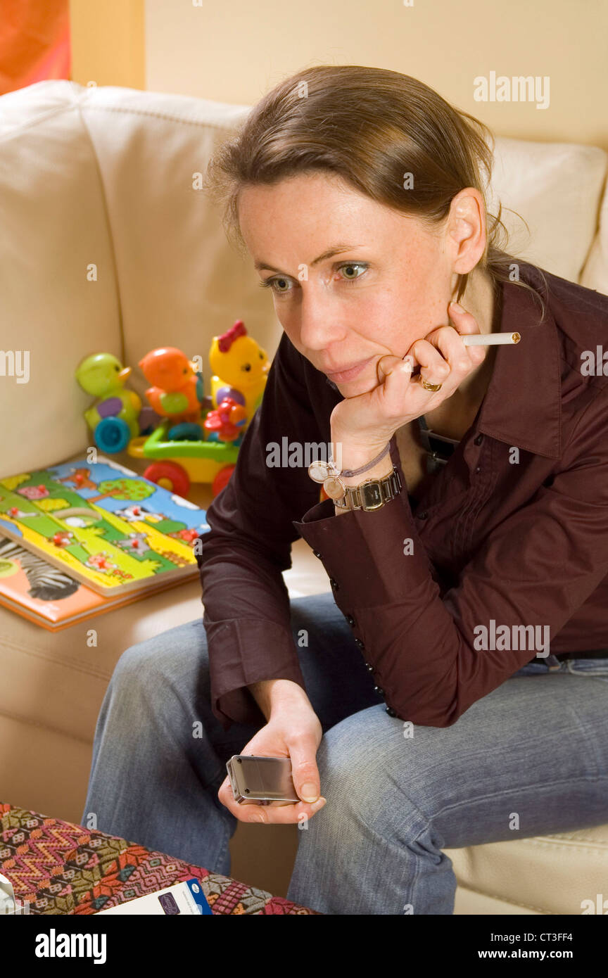 cigarette mum Smoking mum with baby hi-res stock photography and images