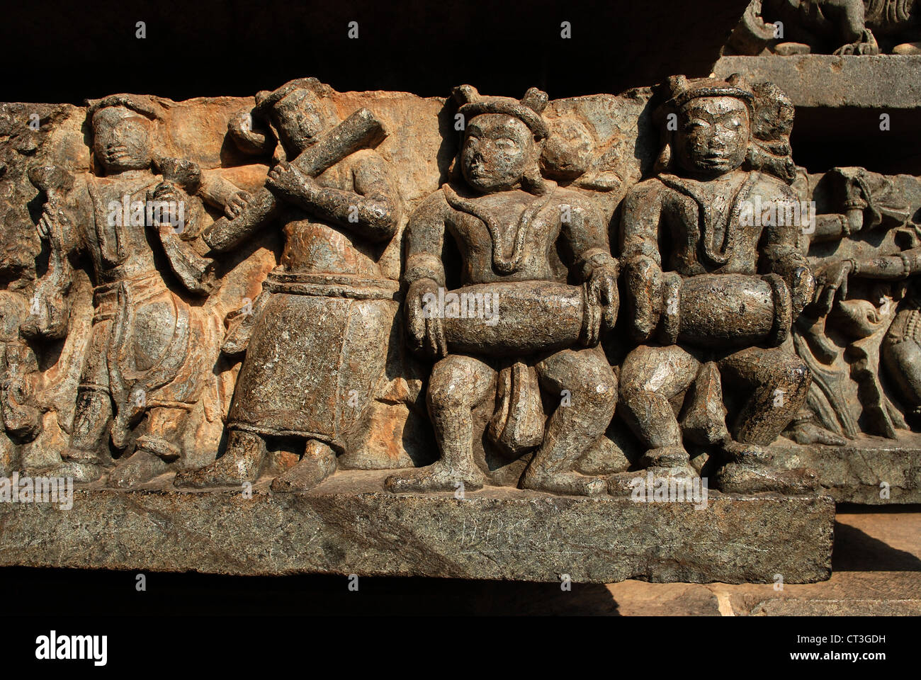 gods playing musical instruments ; a stone carving from a hindu temple ...