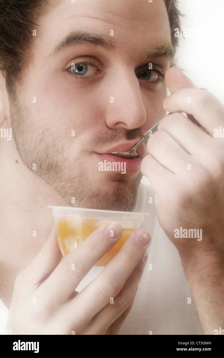 MAN EATING FRUIT Stock Photo Alamy