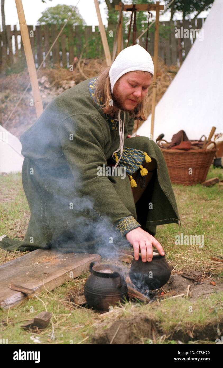 Torgelow, man cooks in medieval market Stock Photo - Alamy