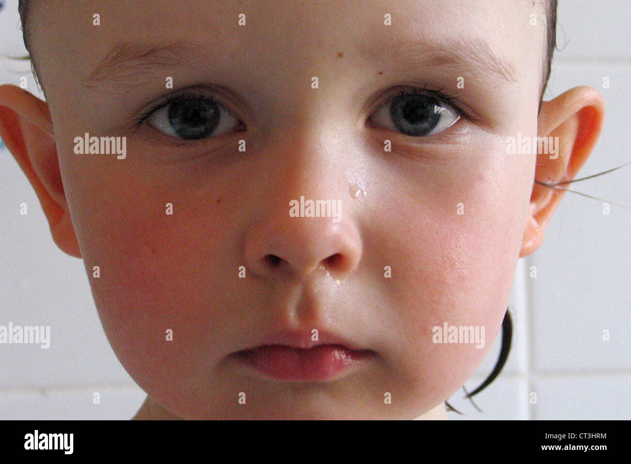 Symbolfoto sad child's face Stock Photo