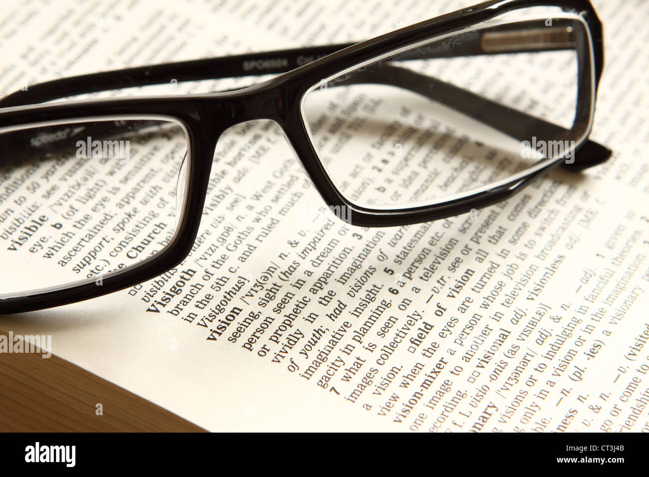 Glasses eyesight looking at the word vision Stock Photo