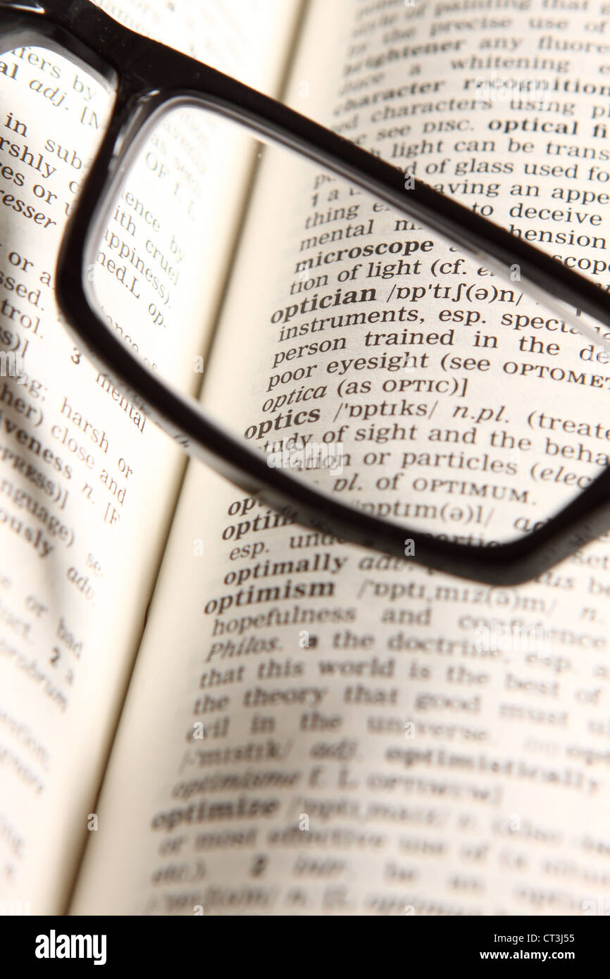 Glasses eyesight looking at the word optician Stock Photo