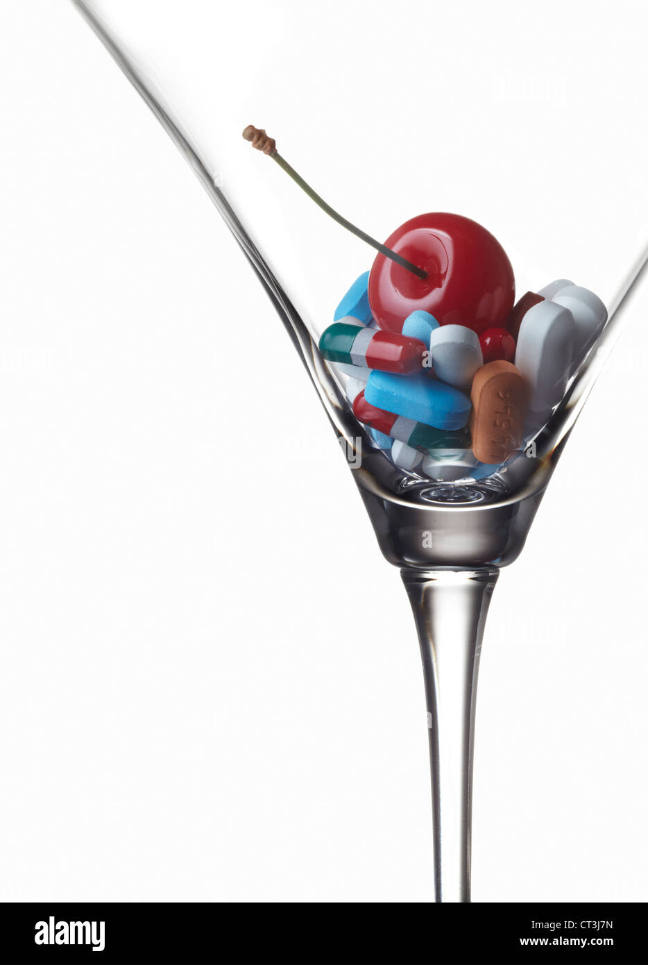 Close up of pills in cocktail glass Stock Photo