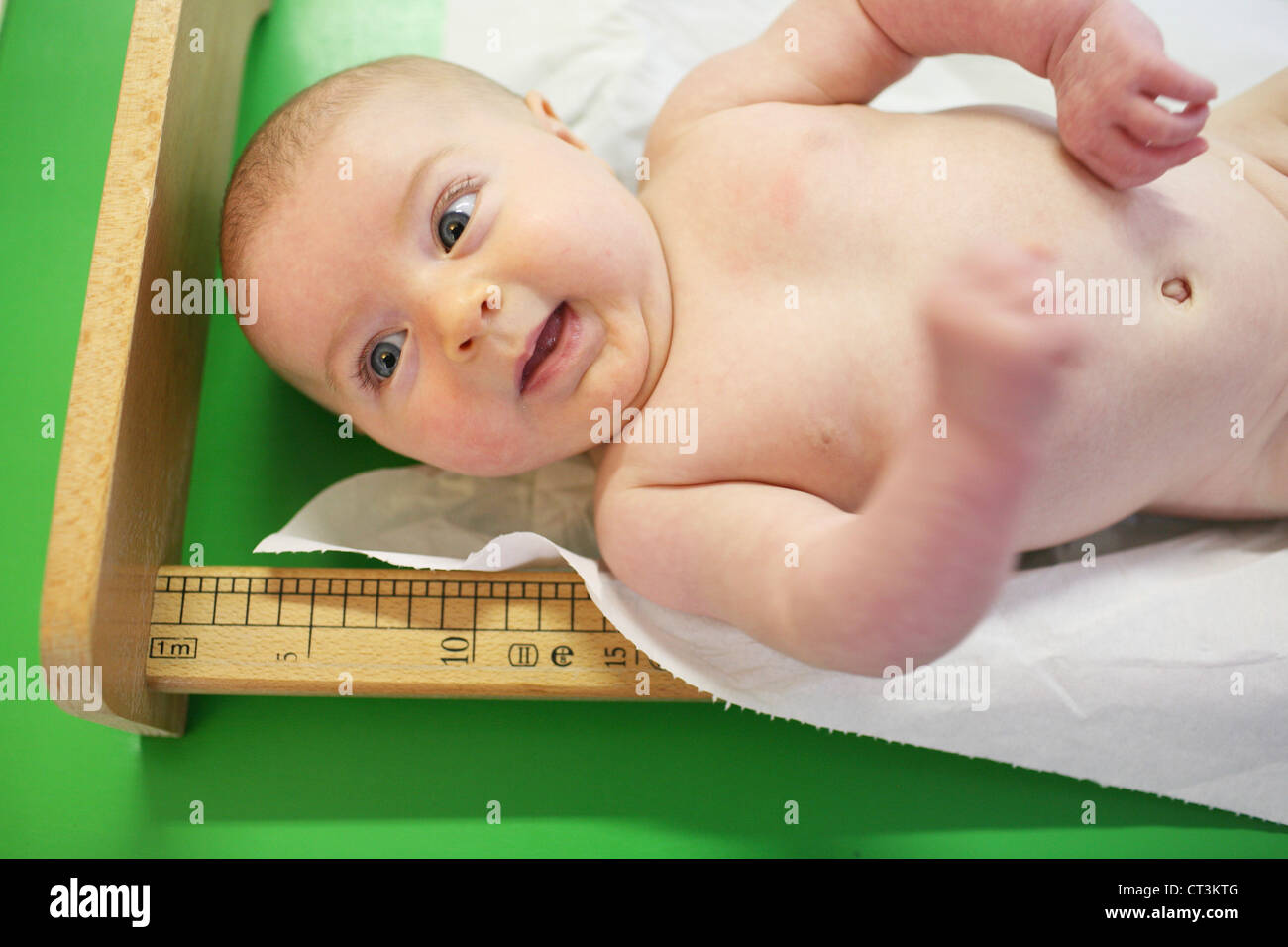 MEASURING HEIGHT, INFANT Stock Photo - Alamy