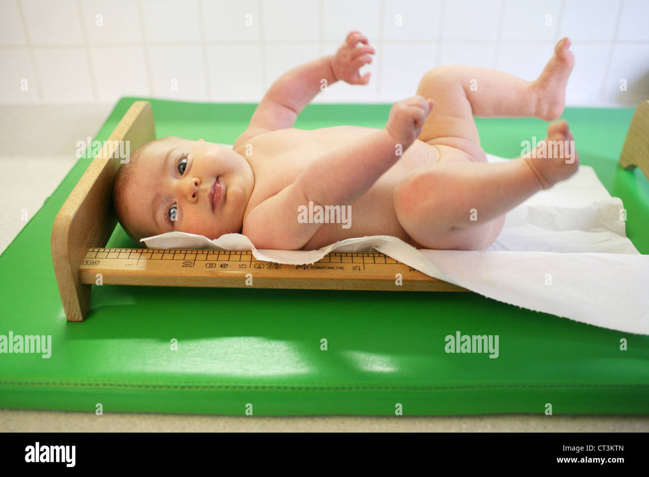 Measuring infant length hi-res stock photography and images - Alamy