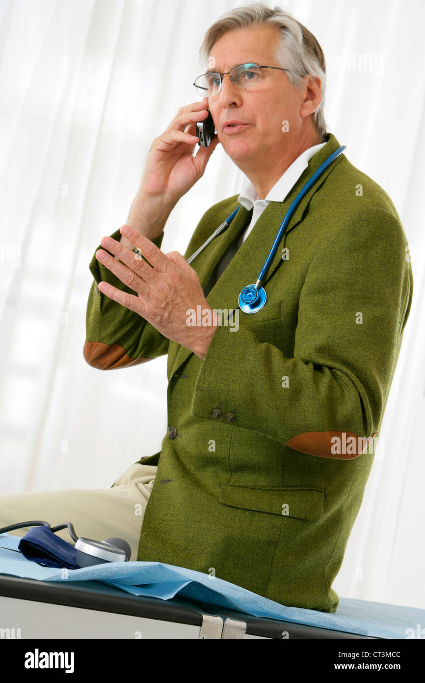 Elderly doctor talking on phone hi-res stock photography and images - Alamy
