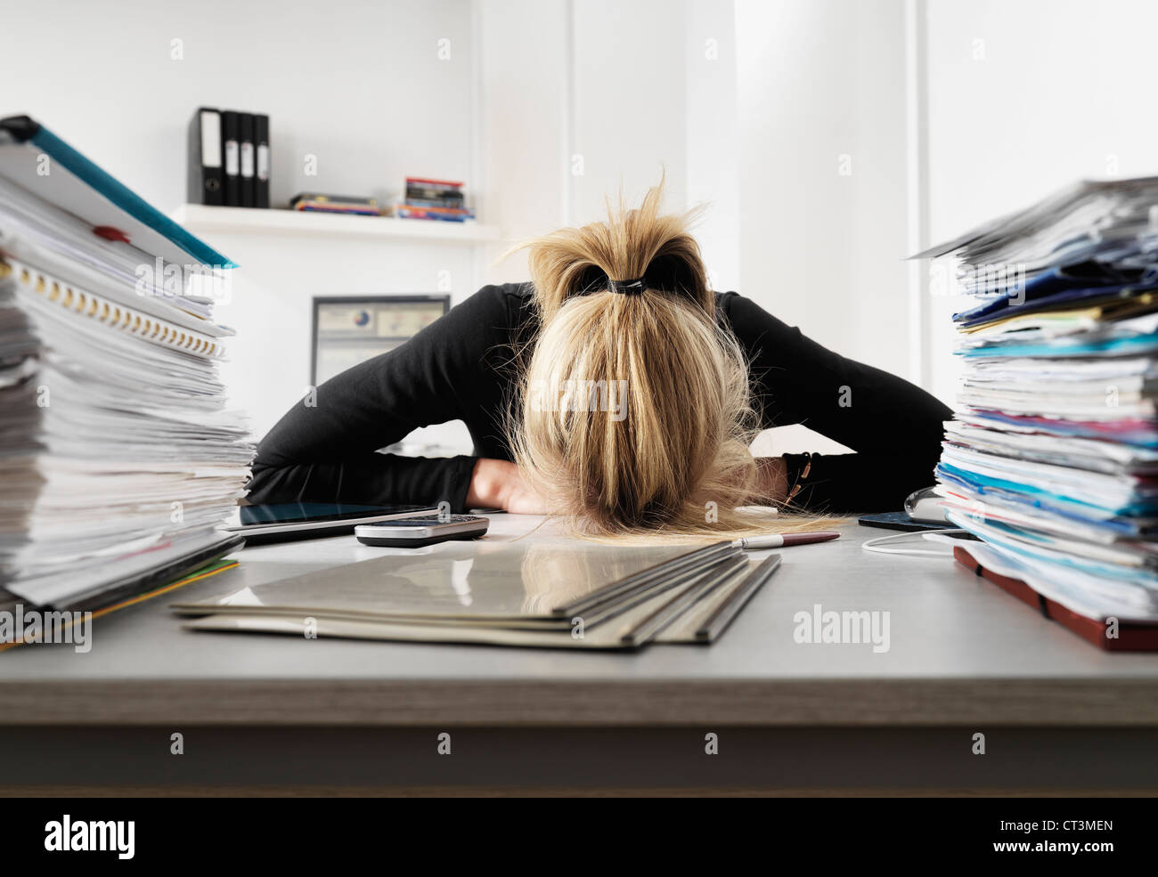 Businesswoman resting head on desk Stock Photo 49254429 Alamy
