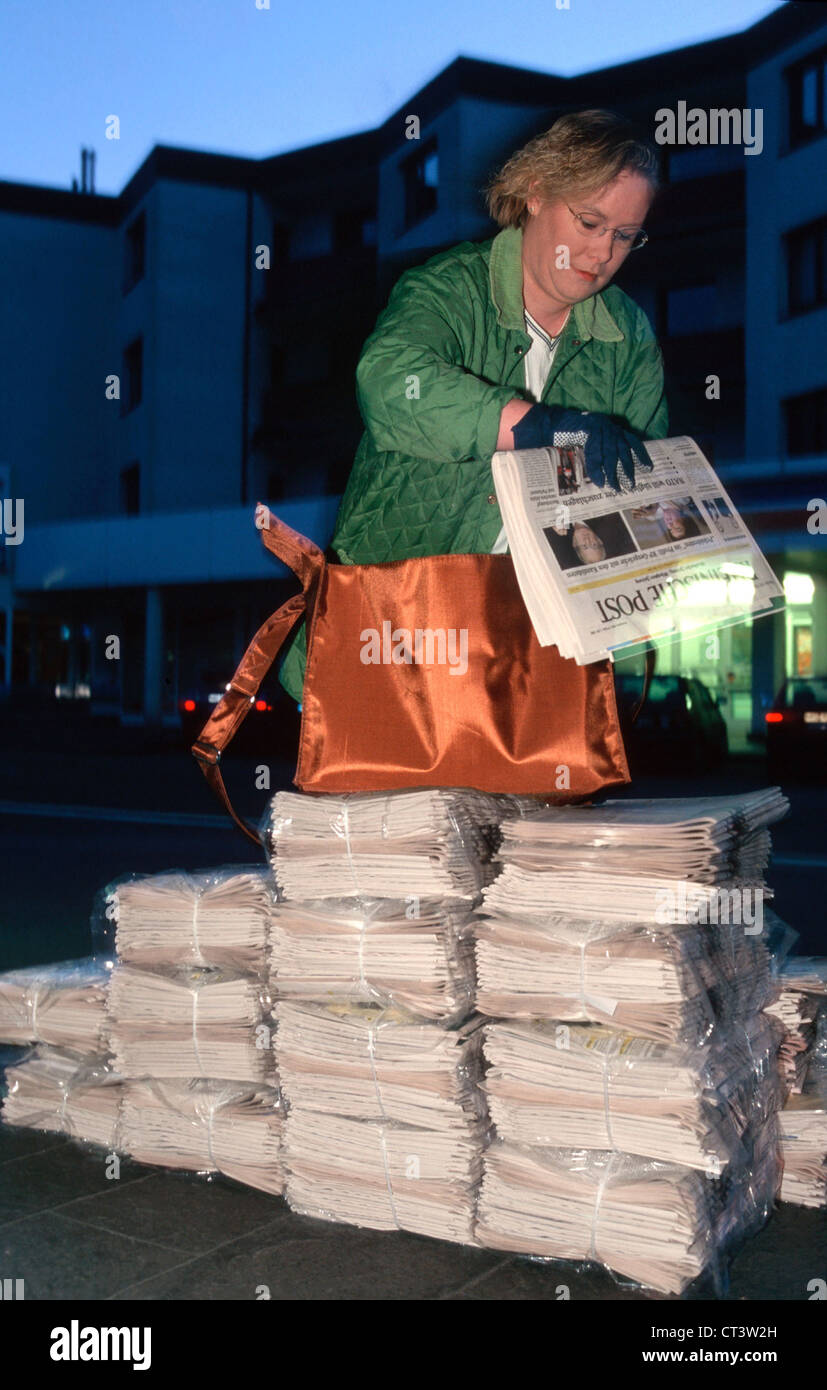 Newspaper delivery man hires stock photography and images Alamy