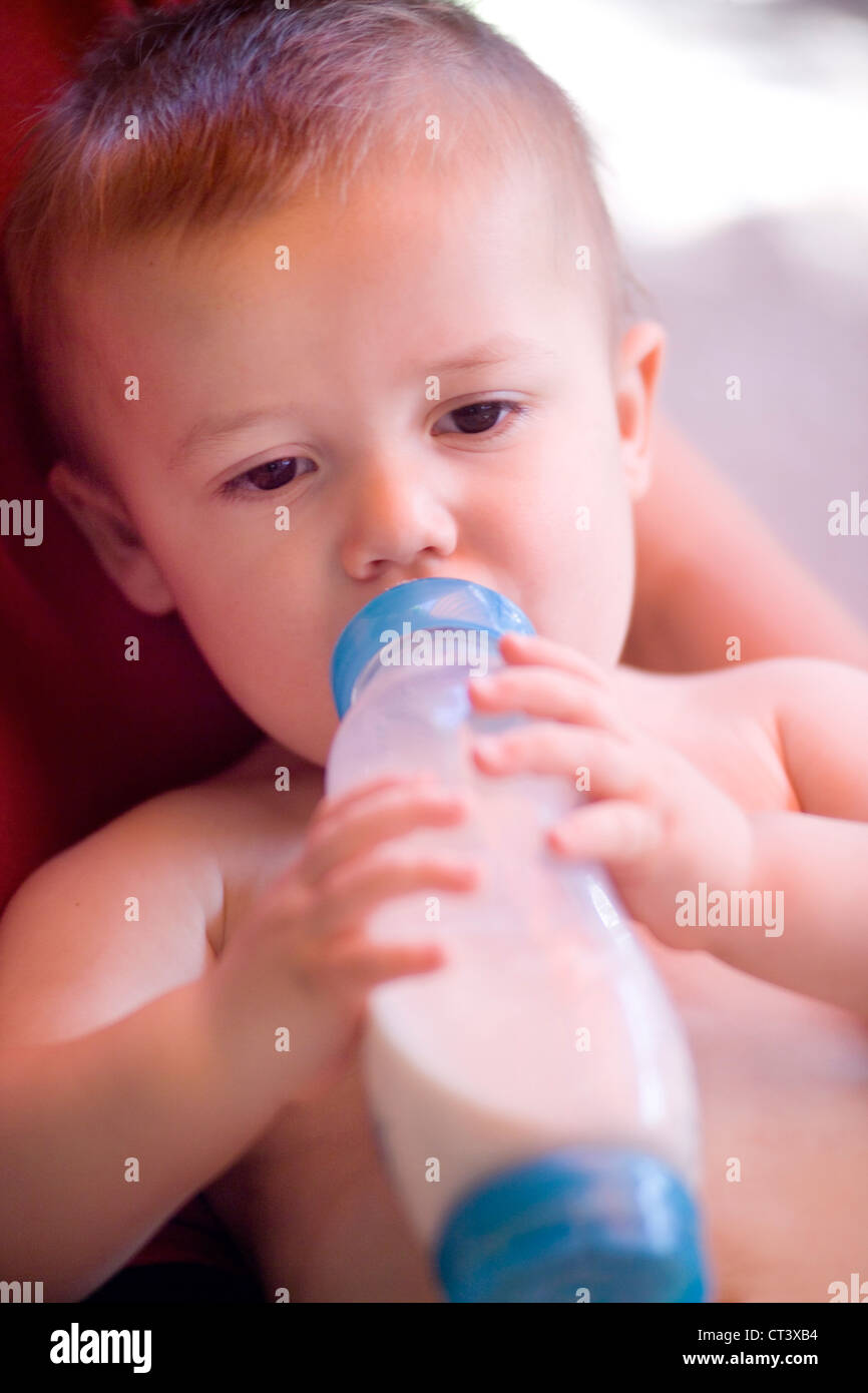 CHILD WITH BABY BOTTLE Stock Photo Alamy