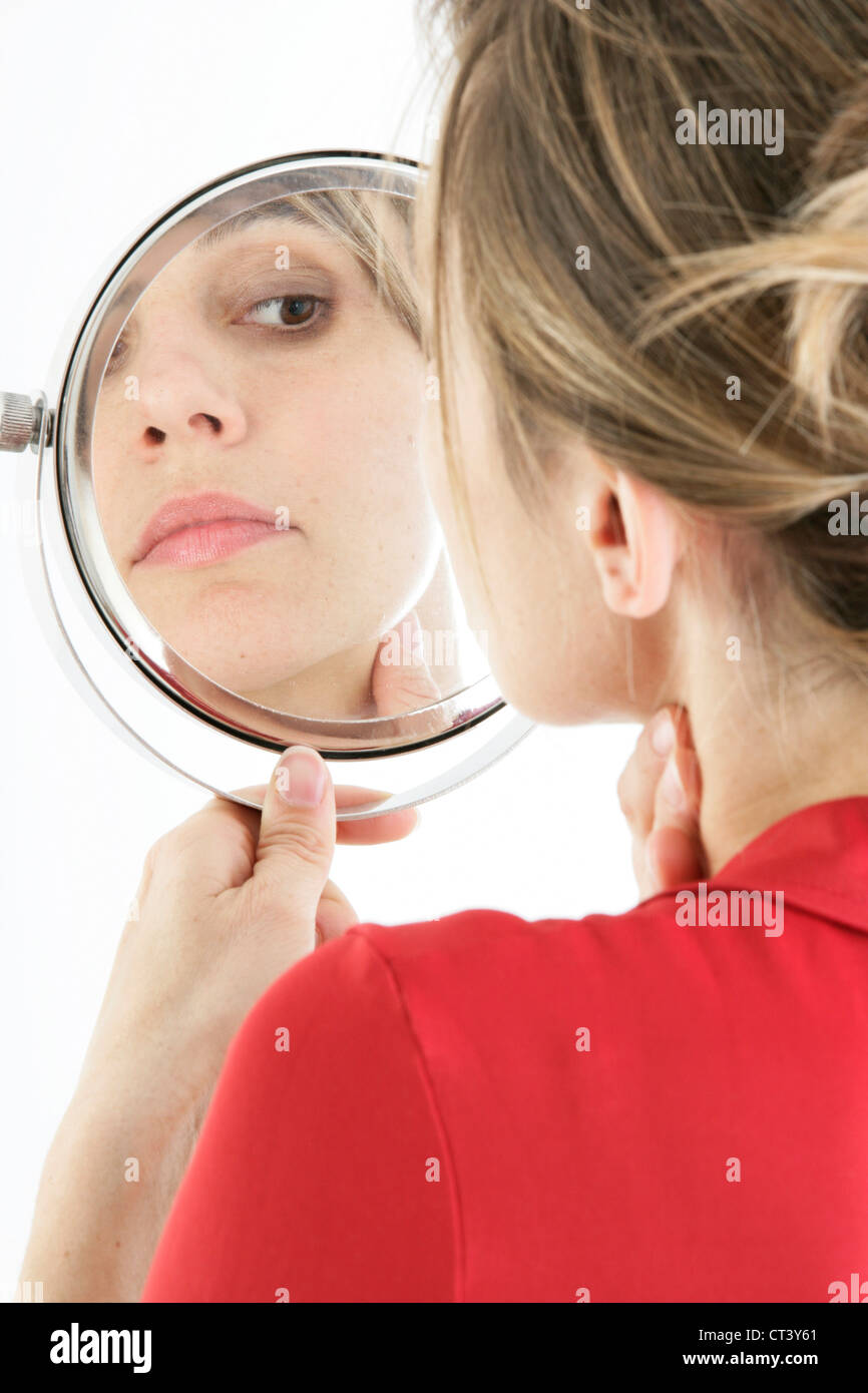 WOMAN WITH MIRROR Stock Photo