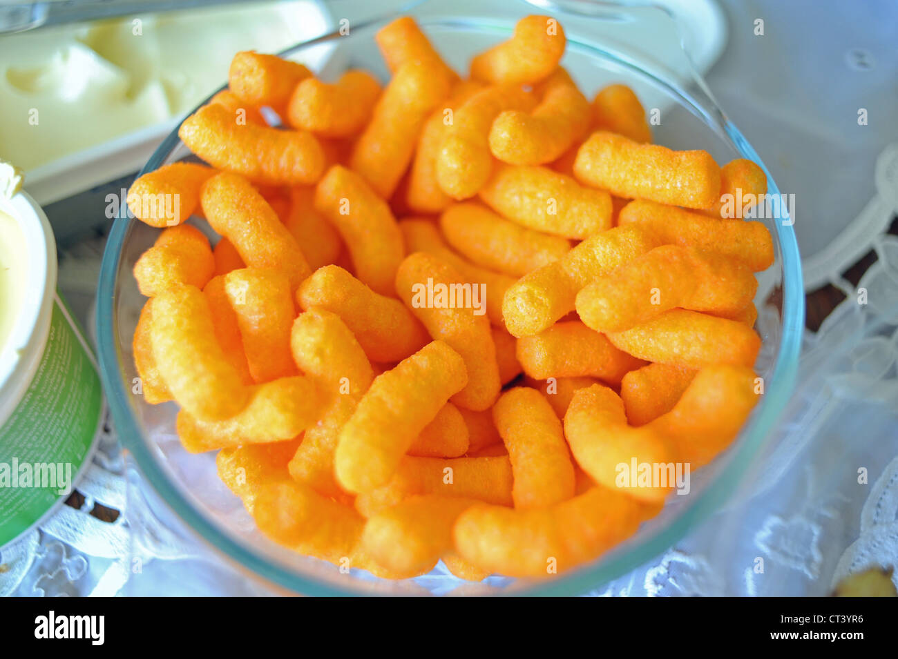 Bright orange coloured cheese wotsit snack food Stock Photo Alamy