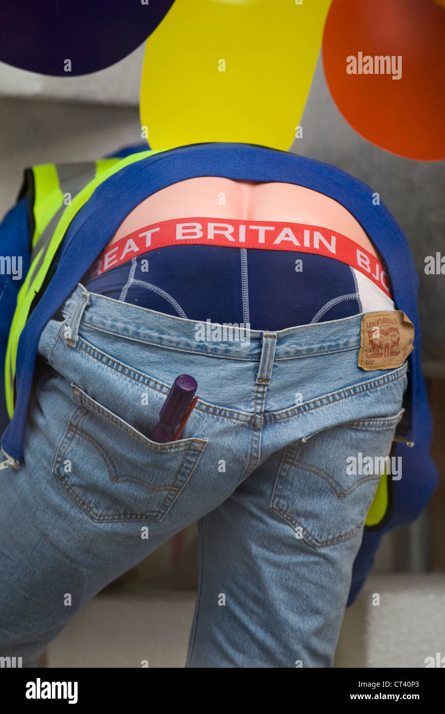 Shop window display in London England Man Bending over in a window with the  words Great Britain on his pants Stock Photo - Alamy