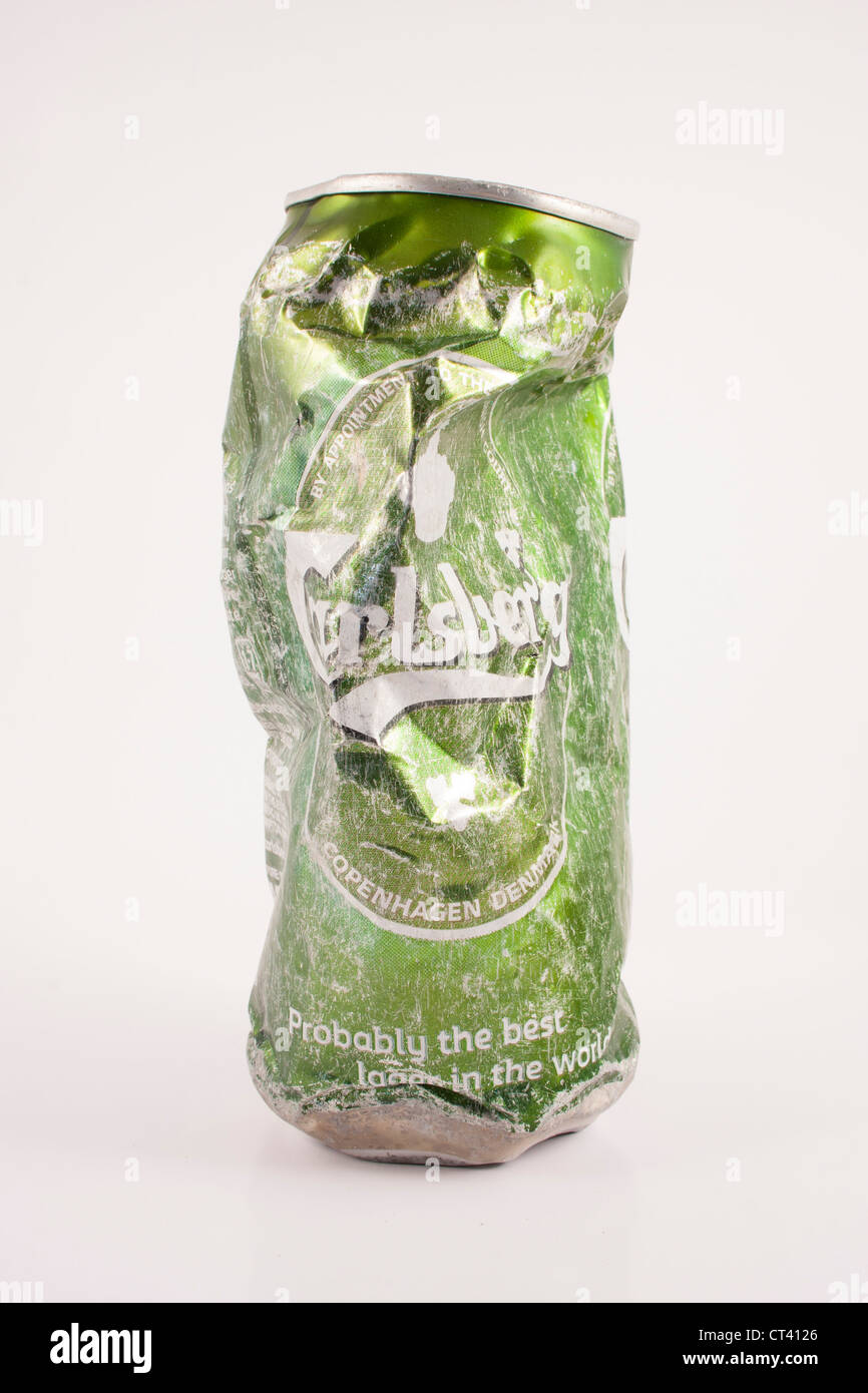 Green crumpled beer can isolated Stock Photo