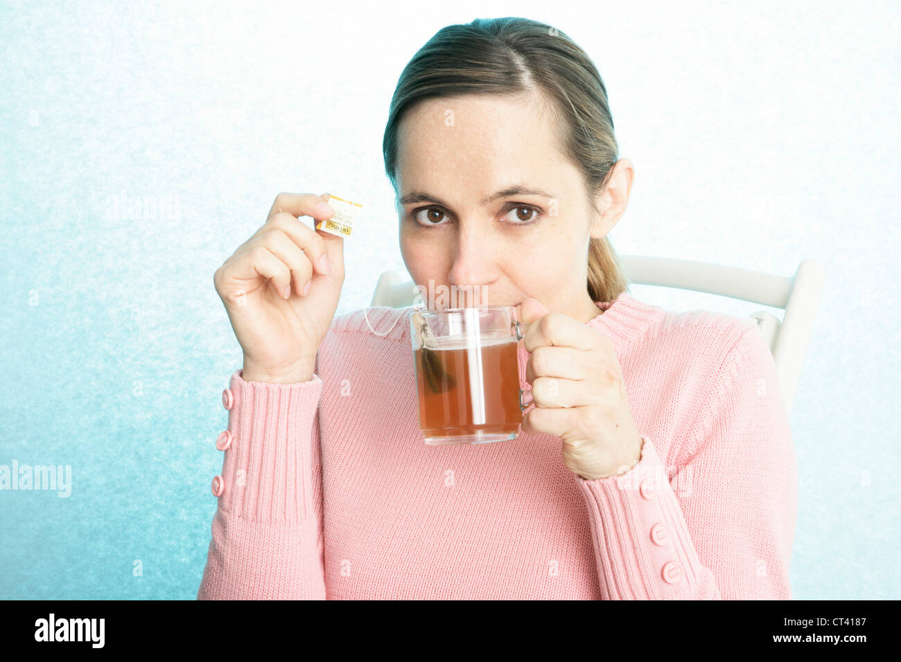 WOMAN WITH HOT DRINK Stock Photo