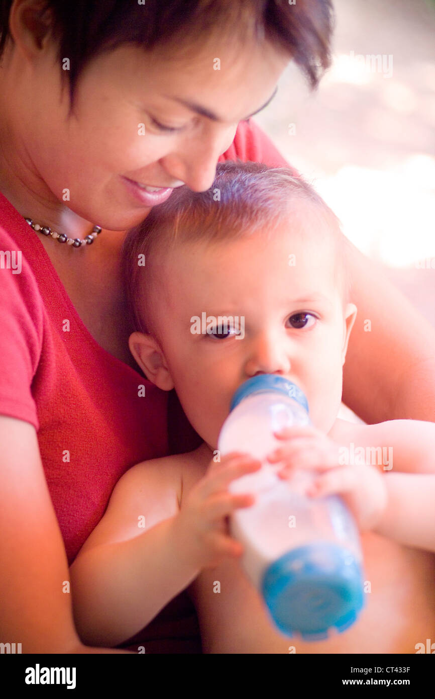 CHILD WITH BABY BOTTLE Stock Photo Alamy