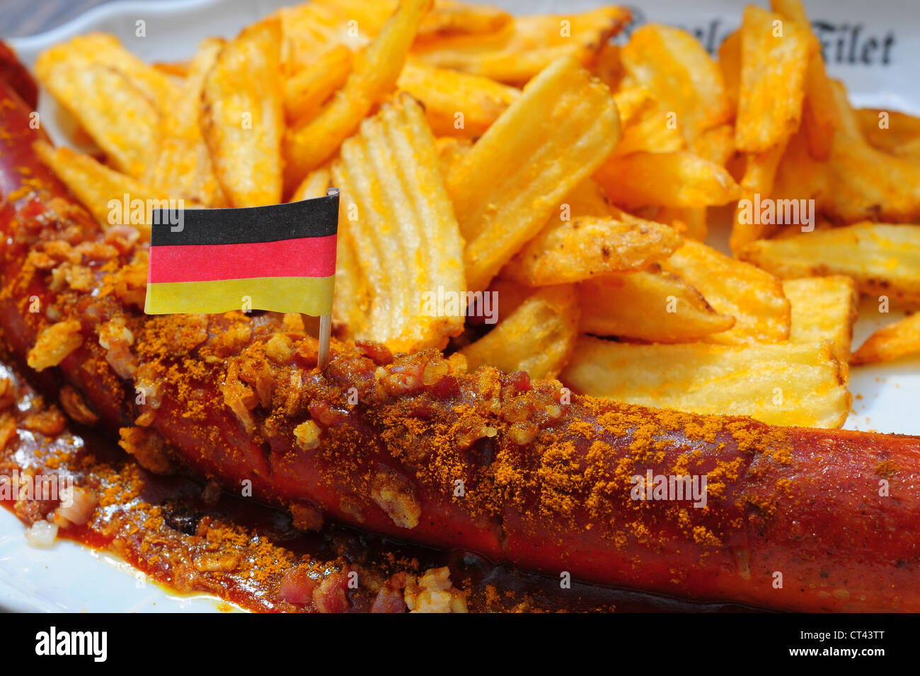 The dish 'currywurst' at a restaurant in Germany Stock Photo