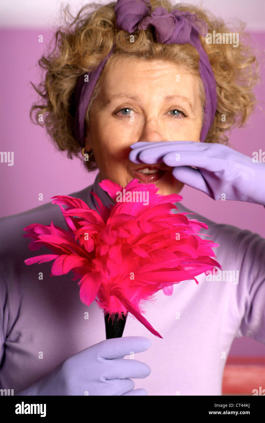 Elderly lady dusting hi-res stock photography and images - Alamy