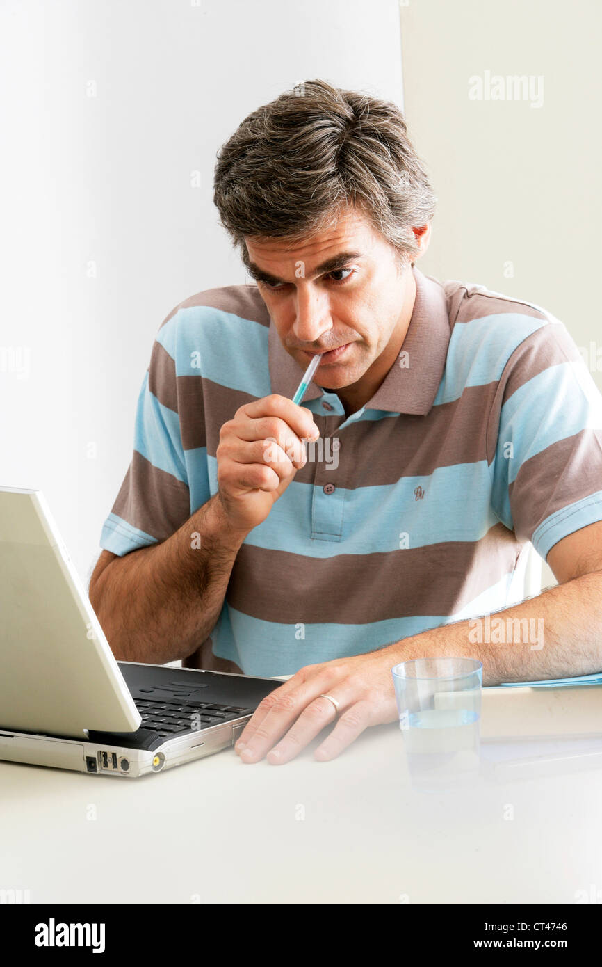 Man Using Brush On Computer MAN USING A COMPUTER Stock Photo - Alamy