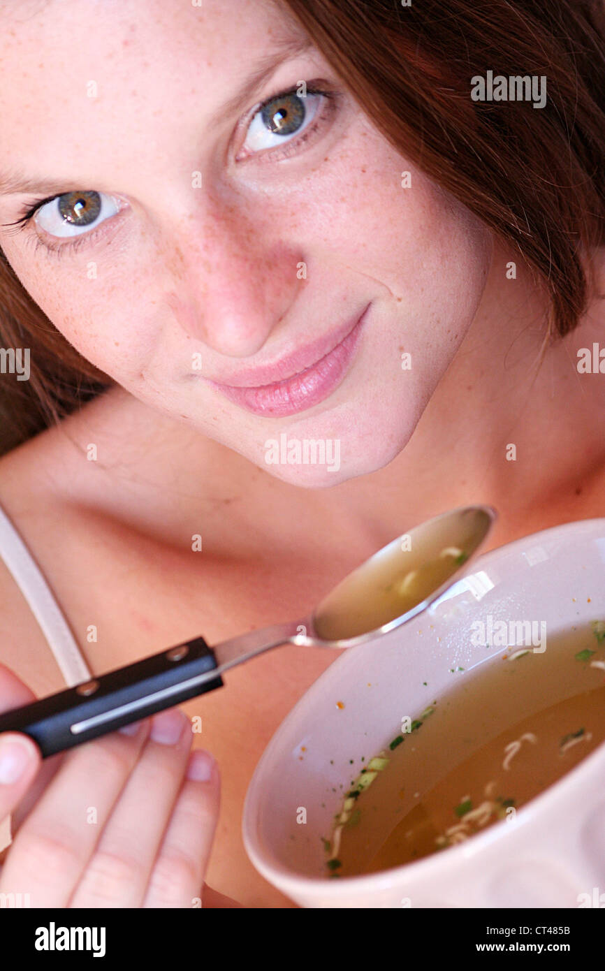 WOMAN EATING SOUP Stock Photo Alamy