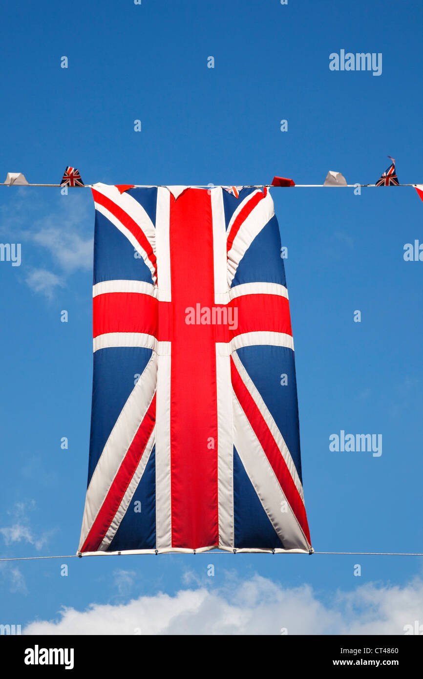 Union Jack flag and pennents hanging in Coventry Street, London as part of the Queens Diamond Jubilee and Olympic games. Stock Photo