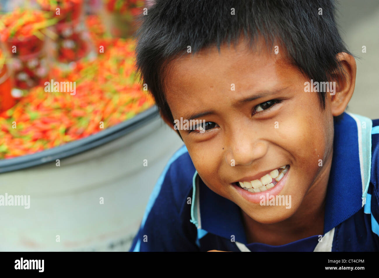 Malaysia, Borneo, Semporna, portrait of smiling boy Stock Photo