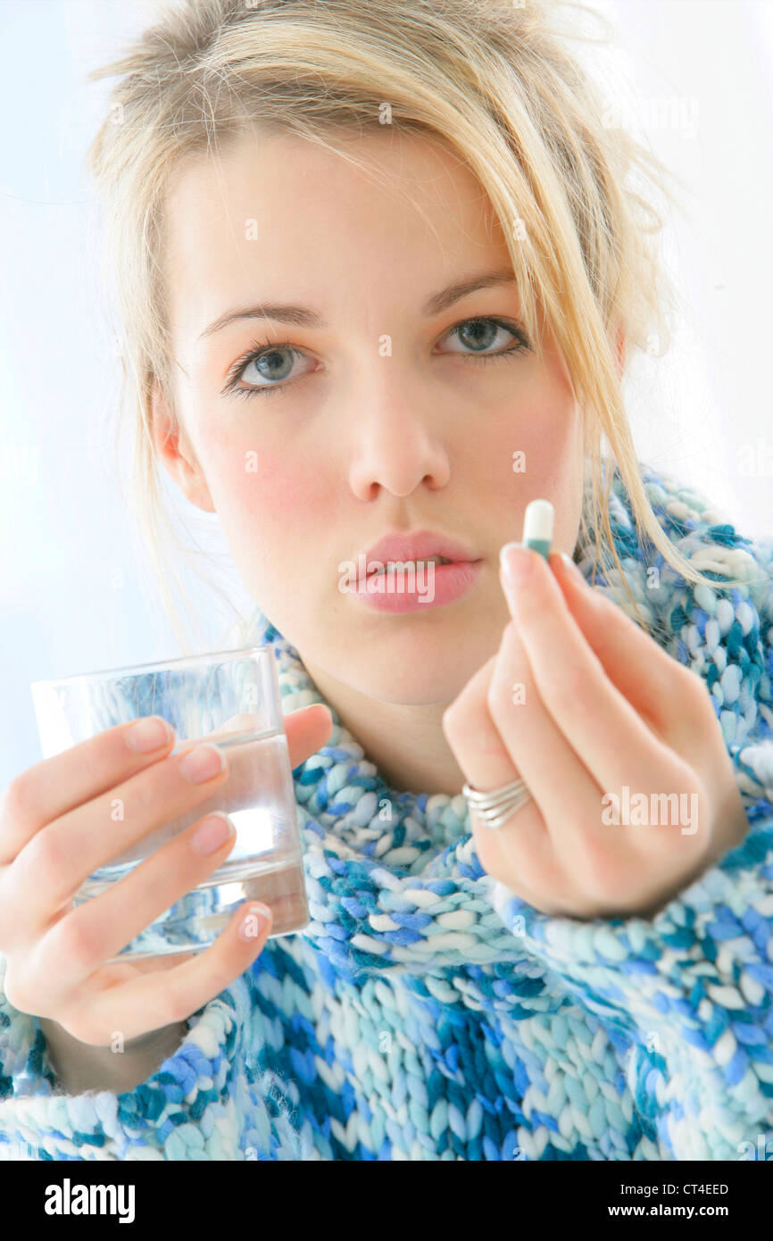 WOMAN TAKING MEDICATION Stock Photo Alamy