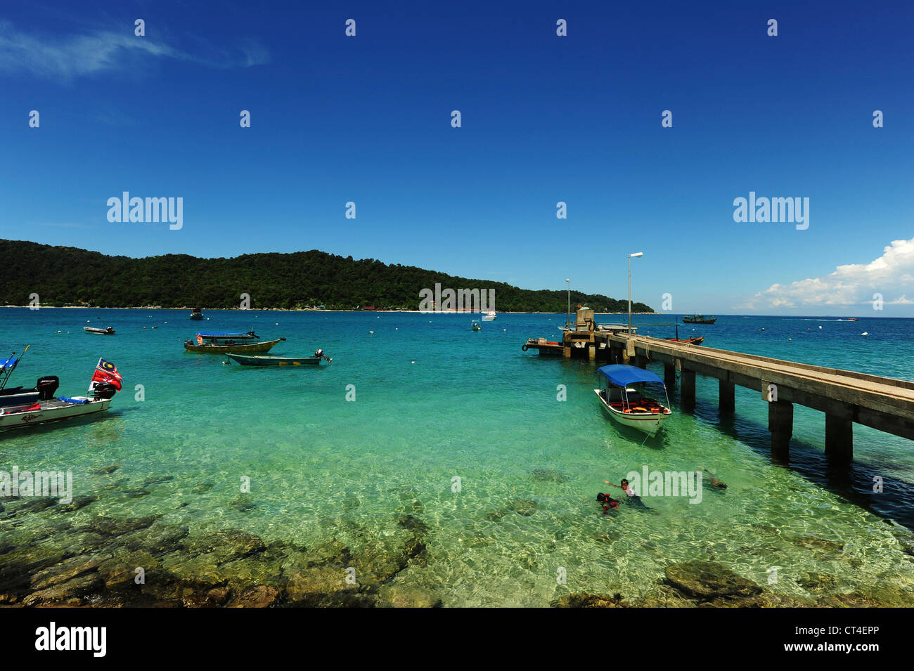 Malaysia, Perhentian Islands, Perhentian Kecil, pontoon into transparent turquoise see Stock Photo