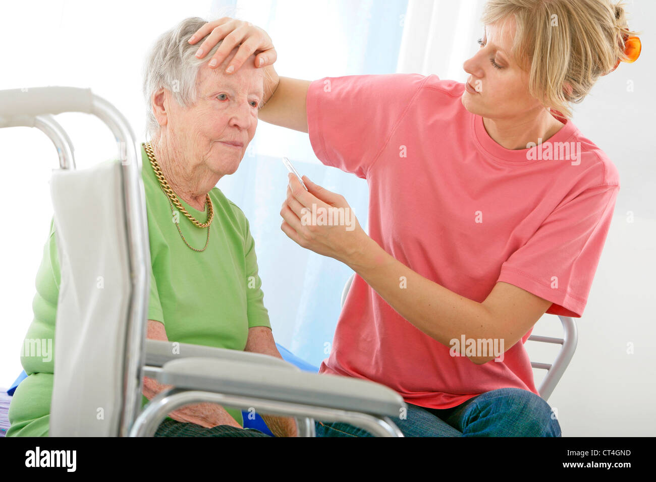 TEMPERATURE ELDERLY PERSON Stock Photo Alamy