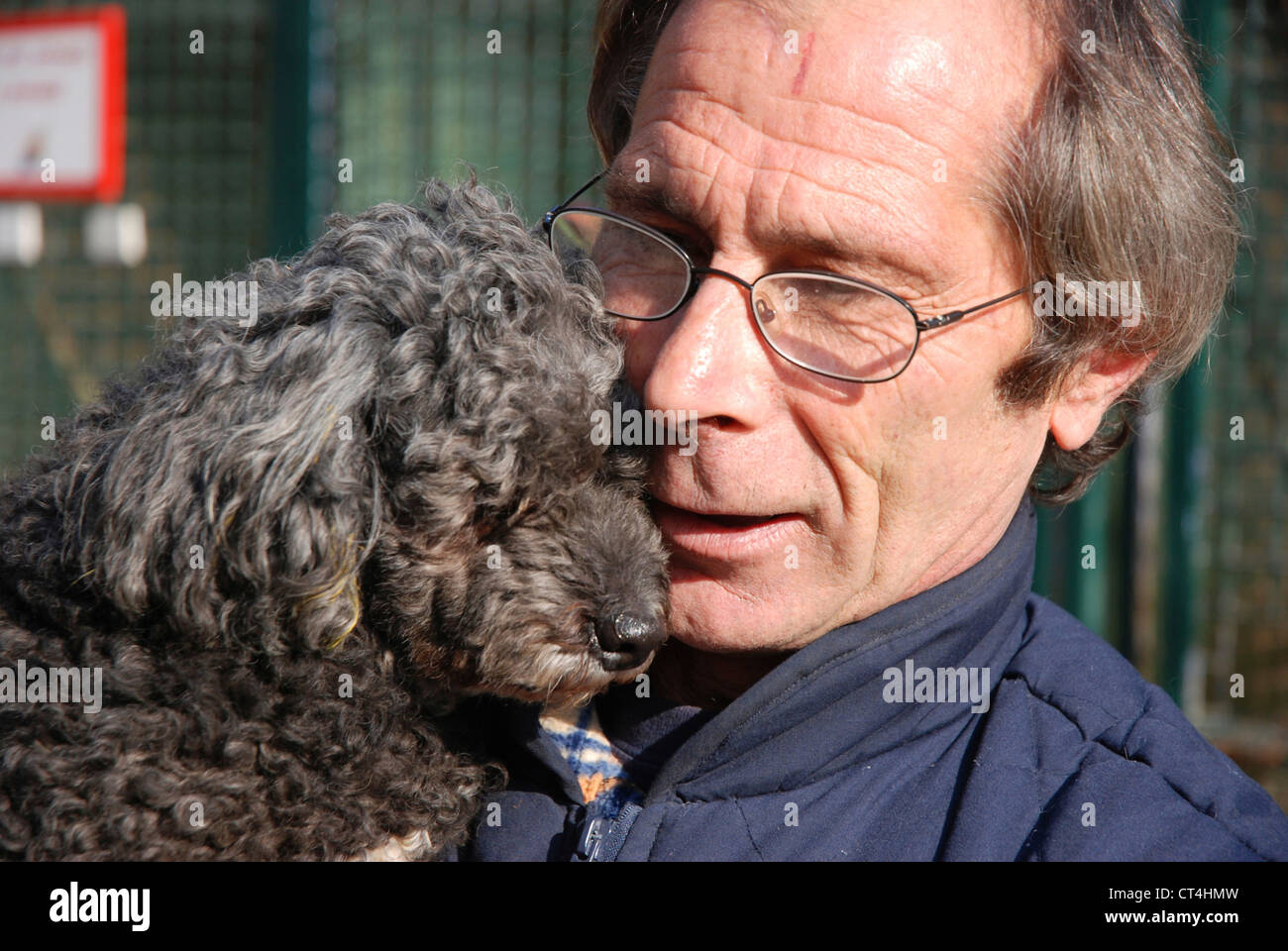 MAN WITH ANIMAL Stock Photo - Alamy