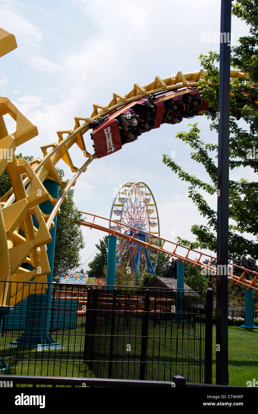 Customers riding the Corkscrew roller coaster at Michigan's Adventure