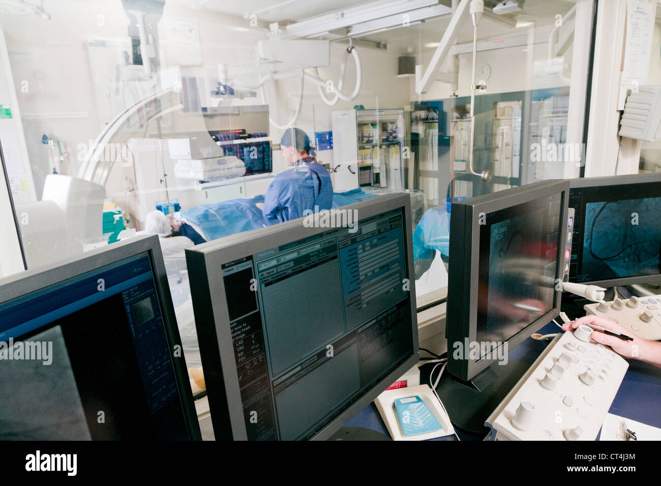 Cathlab in modern hospital with doctor, nurse and patient Stock Photo