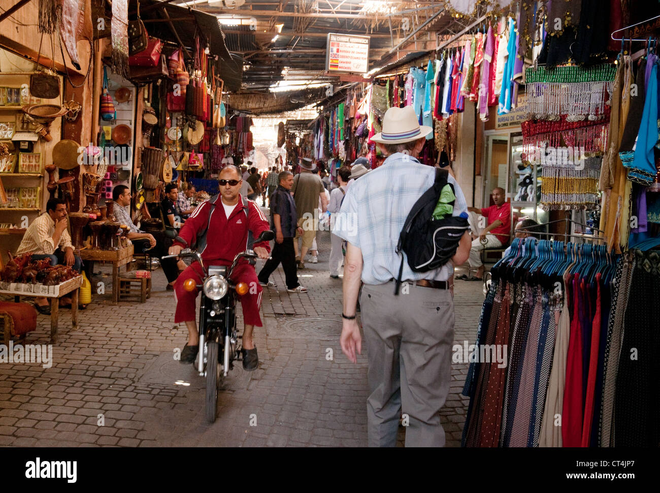 Tourists and locals in the Souk, Marrakech, morocco Stock Photo