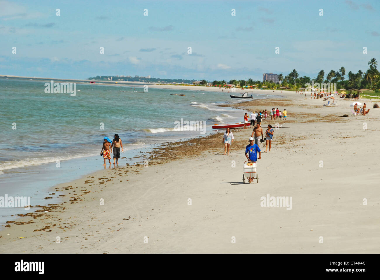 Brazil, Pernambuco, Ilha de Itamaraca, people walking on the beach Stock Photo