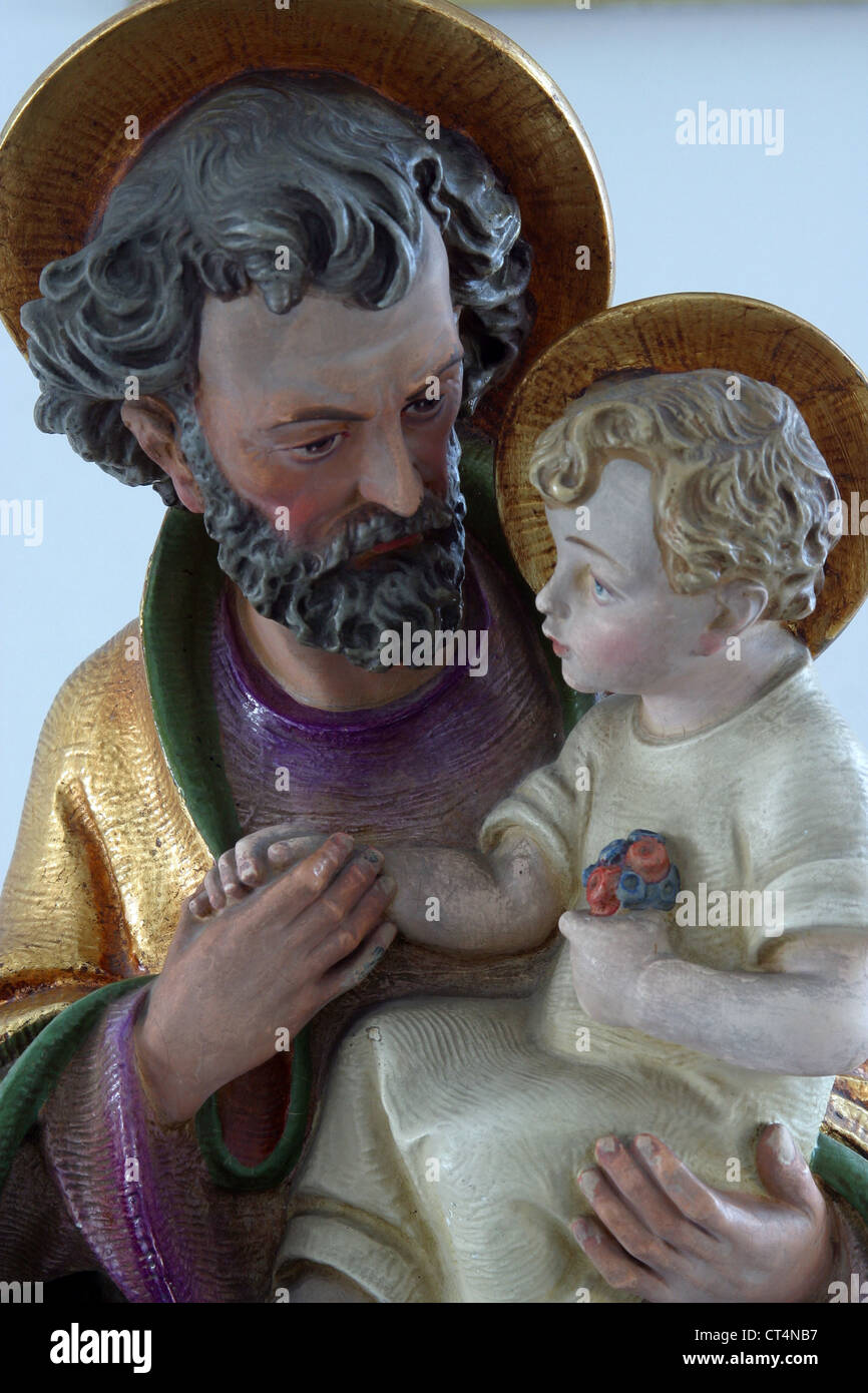 Saint Joseph holding baby Jesus Stock Photo Alamy