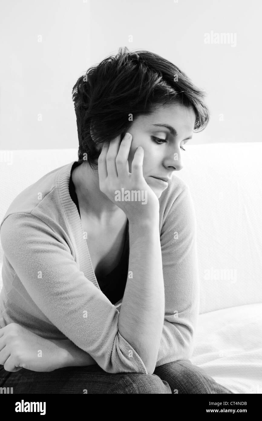 Unhappy unhappiness moody woman Black and White Stock Photos & Images ...