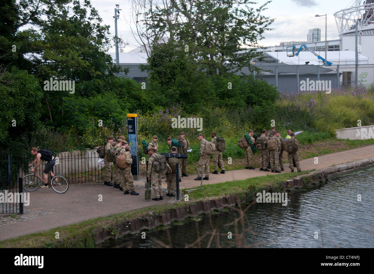 Army soldiers on patrol at closed canal path, Hackney Stock Photo