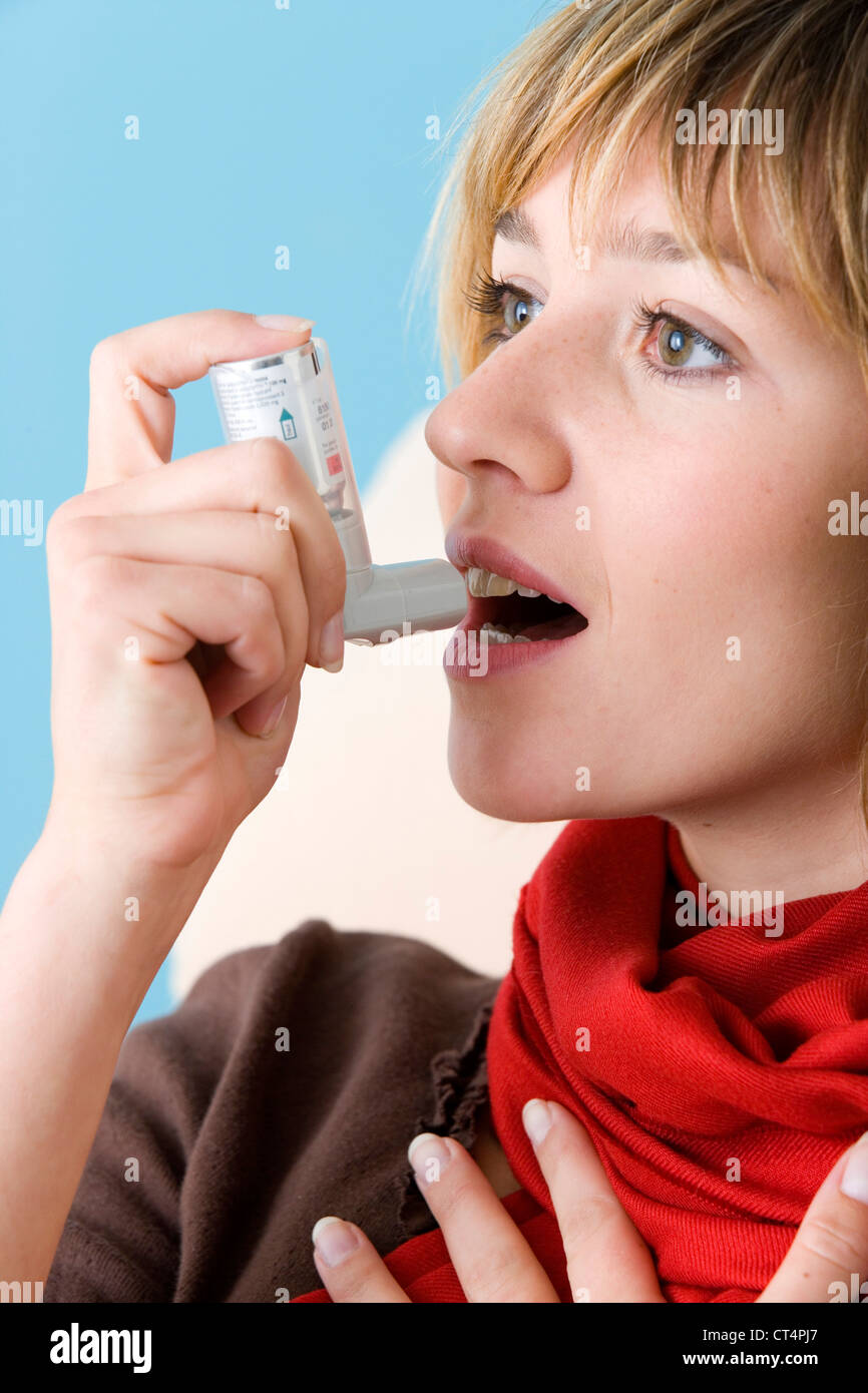 ASTHMA TREATMENT, WOMAN Stock Photo