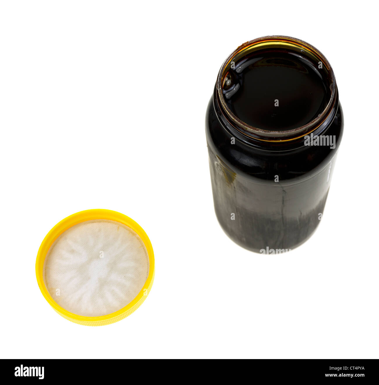 Opened jar of molasses Stock Photo Alamy