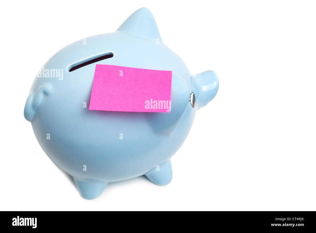 Blue china piggy bank with pink post it note, isolated on white with small soft shadow. Stock Photo