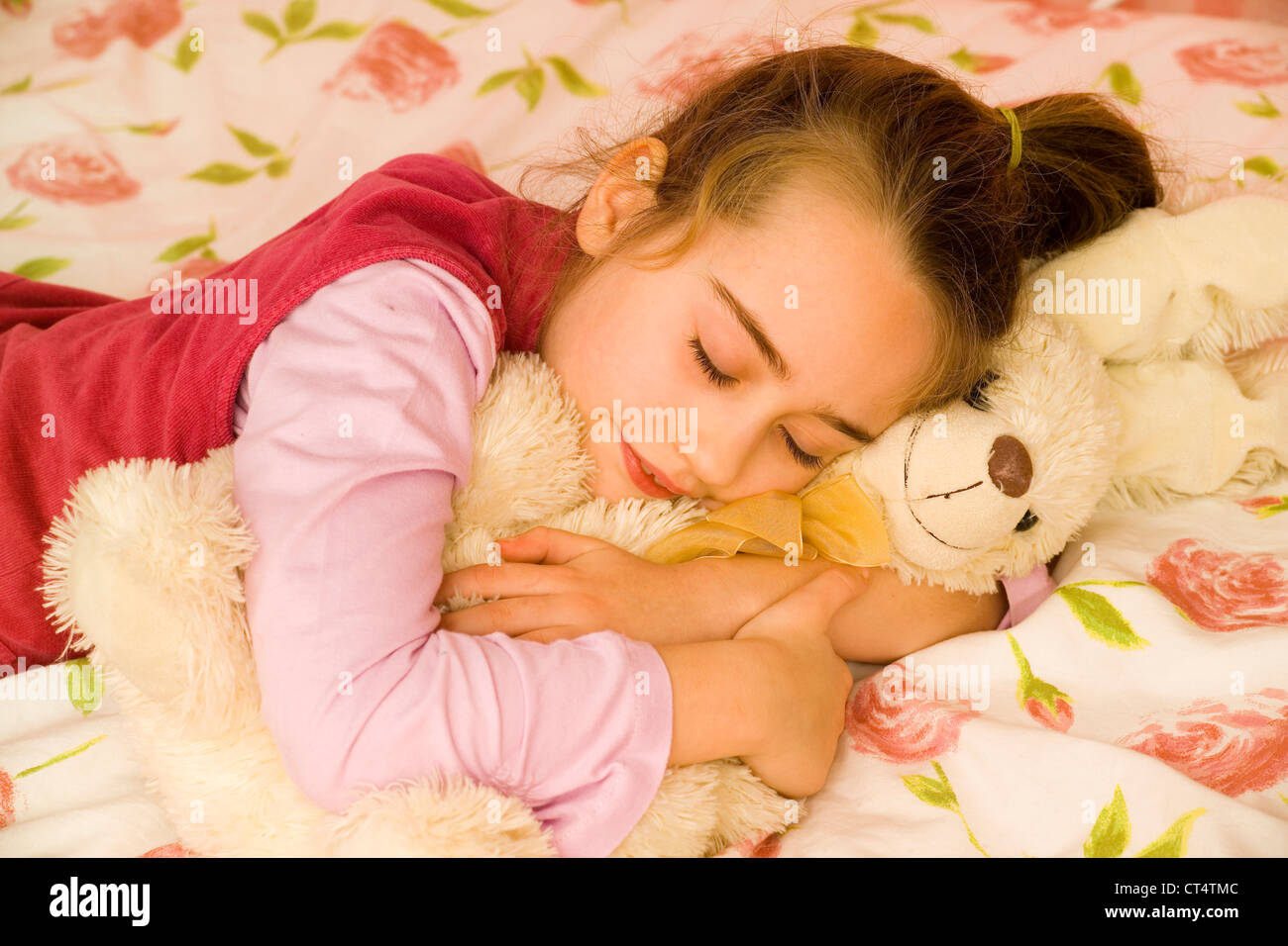 Year old girl sleeping hugging hires stock photography and images Alamy