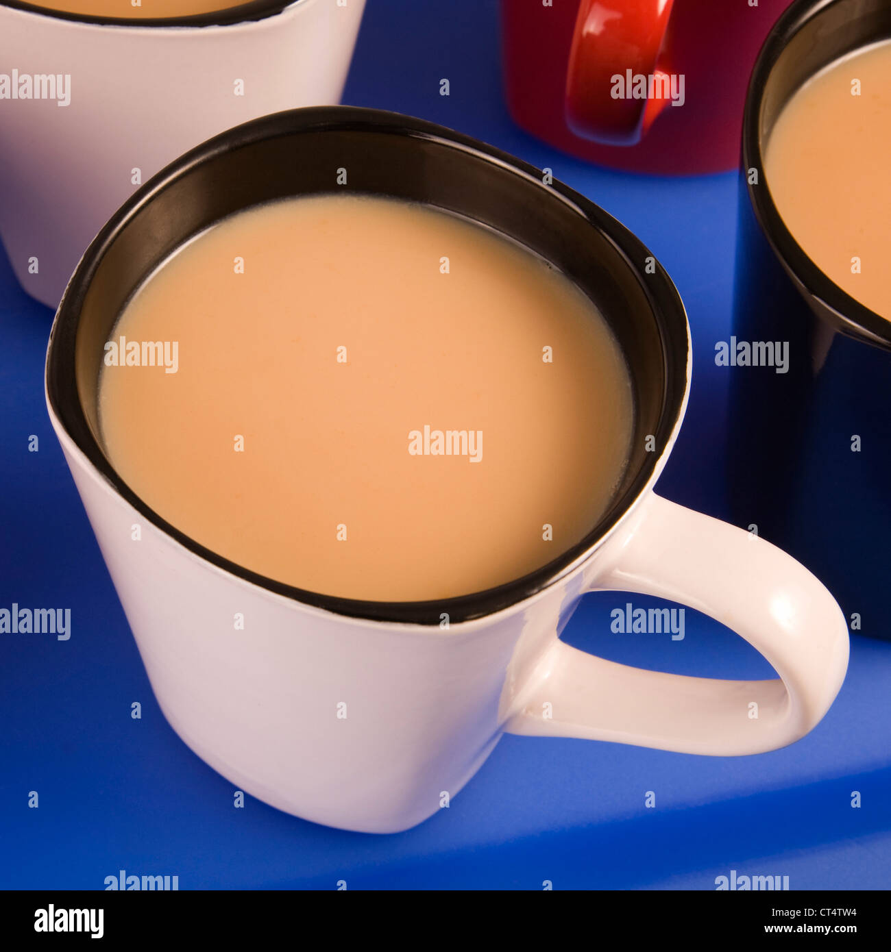 A mug of tea on a blue tray Stock Photo