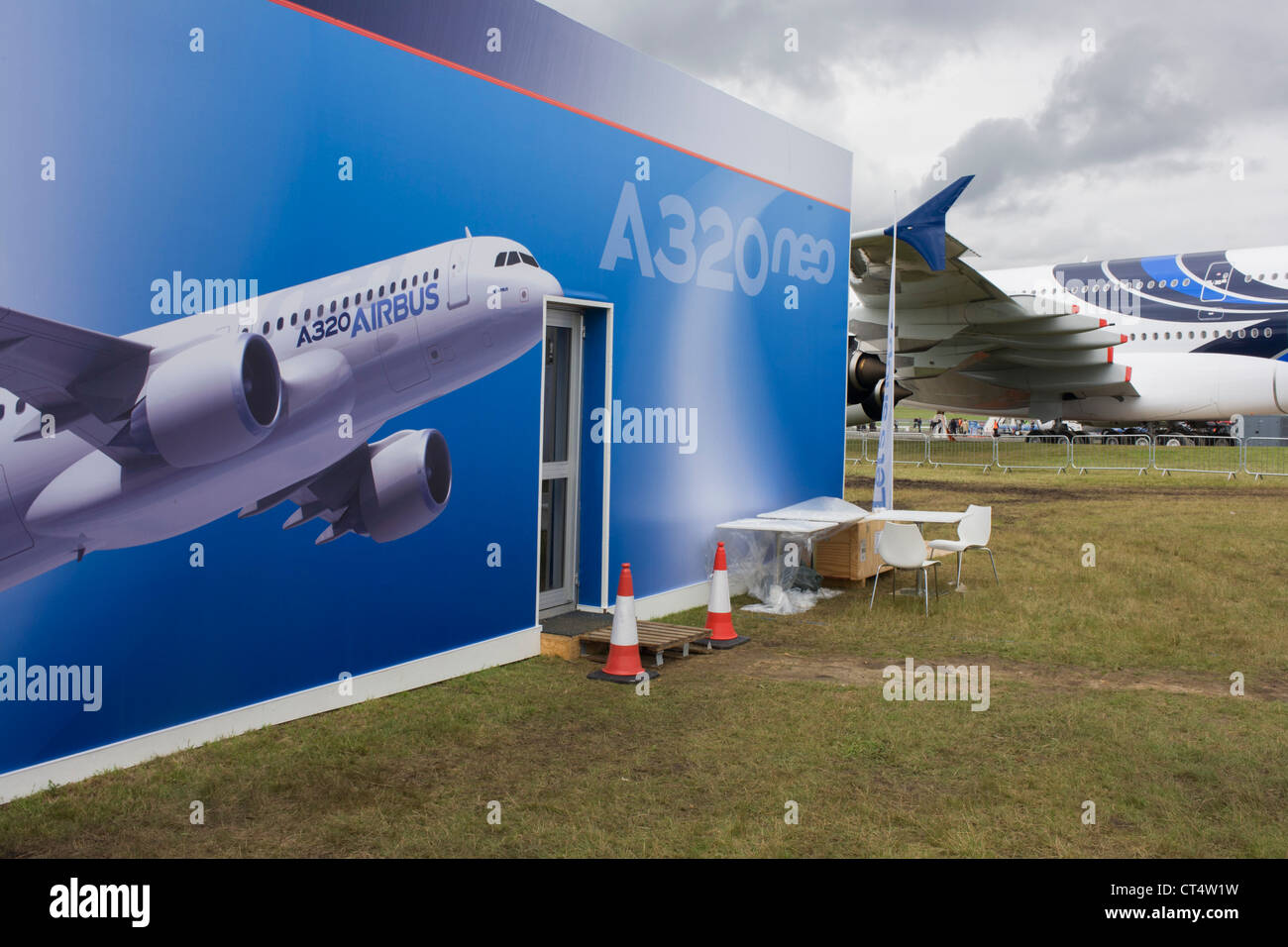 Landscape of a mural artwork of an A320 airliner outside one of the EADS company's chalets at the Farnborough Air Show. Stock Photo