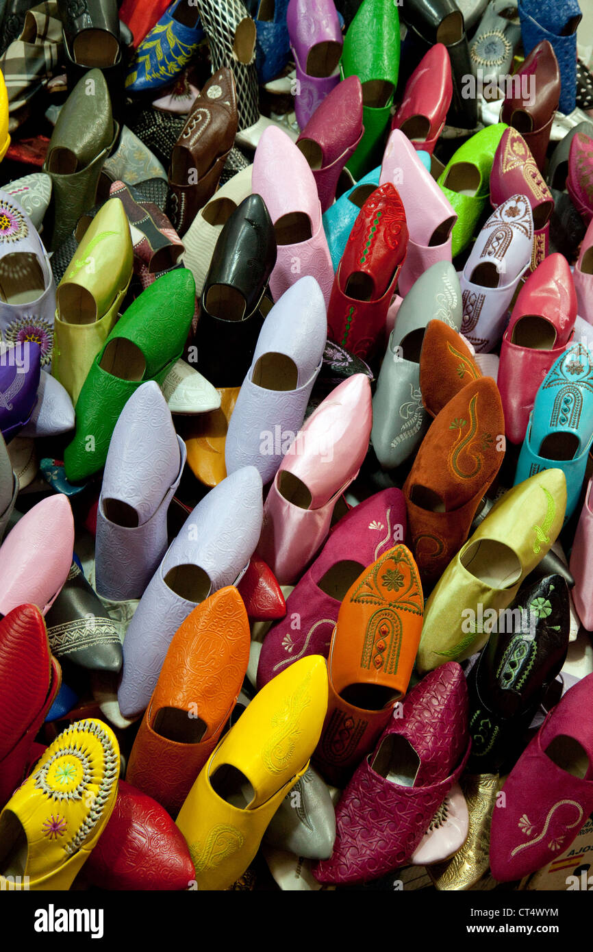 Colourful colorful slippers for sale in the market souk, the medina, Marrakech Morocco Africa Stock Photo