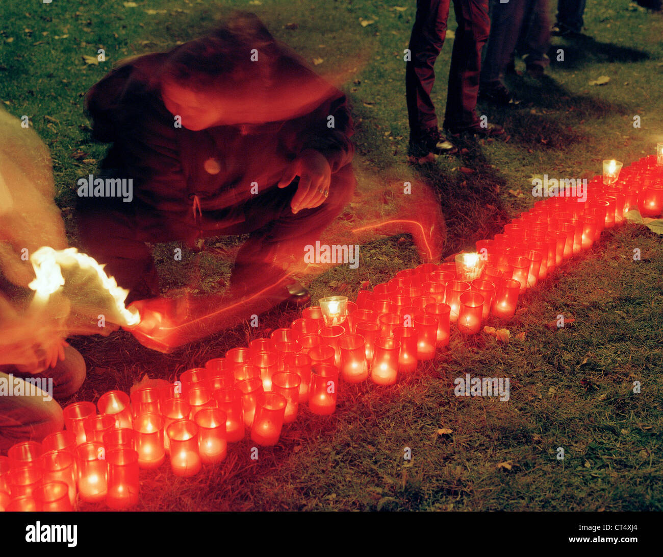 Commemorate the dead of AIDS on World AIDS Day with candles Stock Photo ...