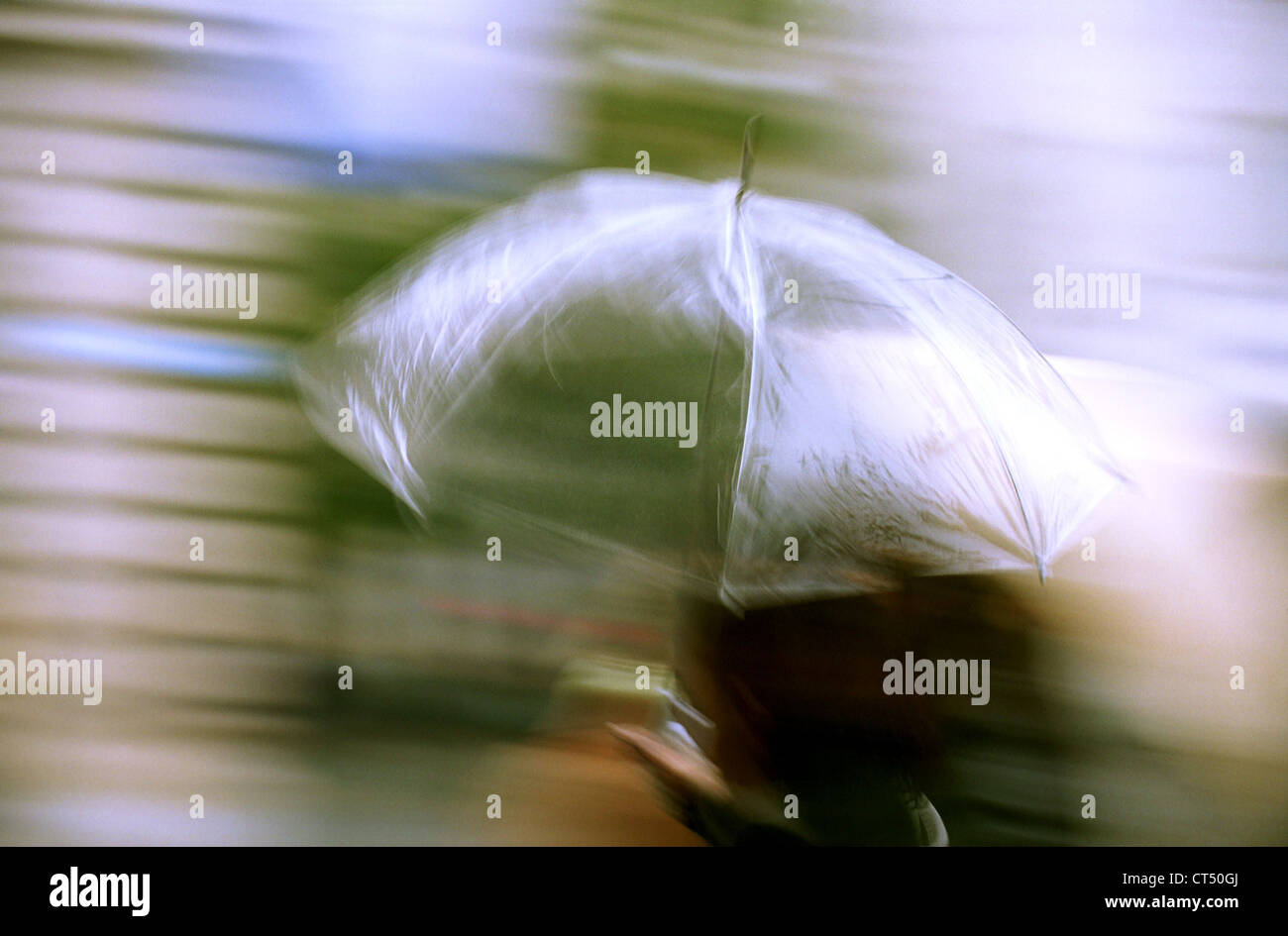 Woman under umbrella transparent Stock Photo - Alamy