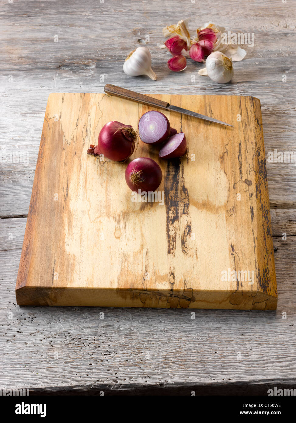 Rustic wood chopping board Stock Photo
